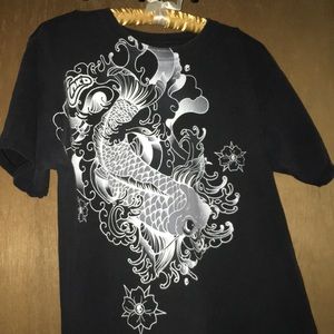 Ink’d tee shirt designed by skull candy